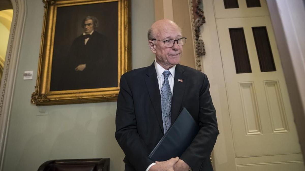 Sen. Pat Roberts, R-Kan., chairman of the Senate Agriculture Committee, pauses as he arrives for a Republican policy luncheon at the Capitol in Washington on Jan. 4.