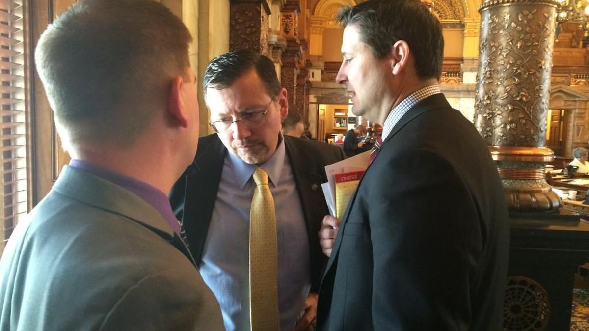 Rep. Ron Ryckman, R-Olathe, the House budget chair, right, confers with Senate Majority Leader Terry Bruce, R-Hutchinson, during a Senate debate on school finance Thursday in Topeka.