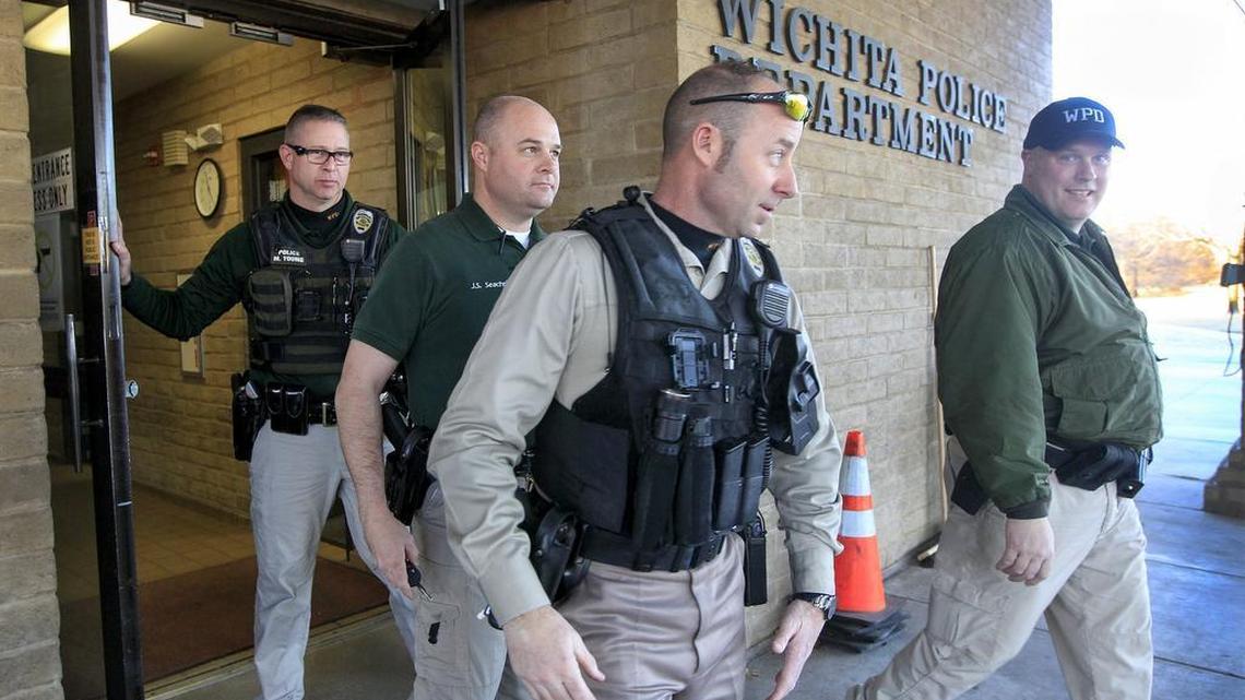 Second-shift Wichita police officers hit the street from their east-side station in January. About 130 officers operate out of a station that was designed for maybe 40 officers.