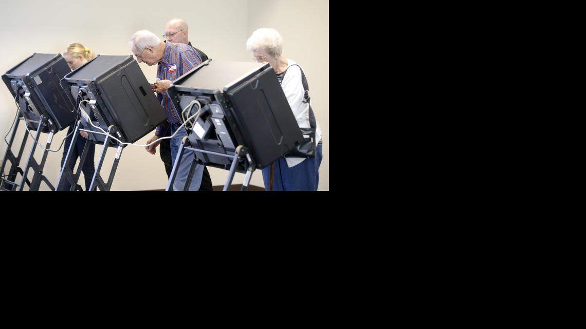 
Voters cast their ballots during advance voting at Grace Presbyterian Church in October.
