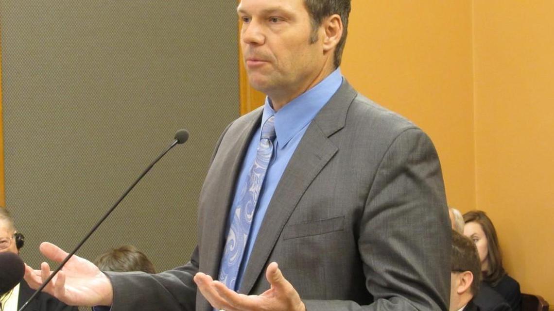 Secretary of State Kris Kobach testifies Monday before the Kansas House Elections Committee.