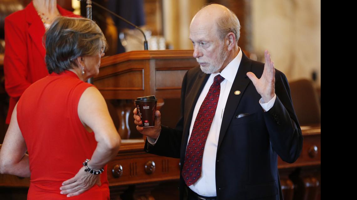 
Sen. Les Donovan and Sen. Susan Wagle, Senate president, talk before the Senate convened Wednesday morning in Topeka. (June 10, 2015)
