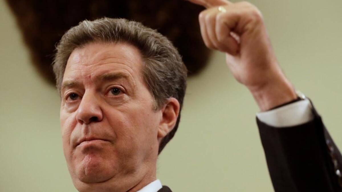 Kansas Gov. Sam Brownback talks to the media during a news conference Thursday, July 27, 2017, in Topeka, Kan. President Donald Trump on July 26 nominated Brownback to be ambassador-at-large for international religious freedom.