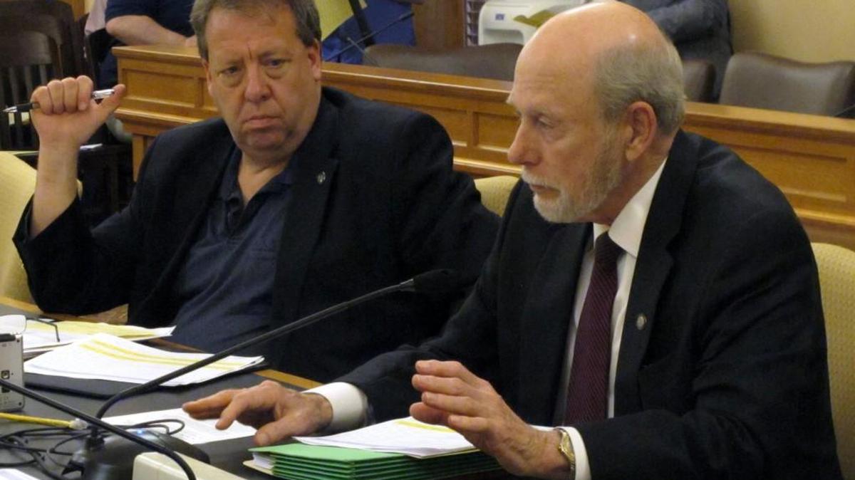 Sen. Tom Holland, D-Baldwin City, left, shown in this 2015 photo with Sen. Les Donovan, R-Wichita, tried Friday to force a vote on a bill to limit campaign contributions by corporations that do business with government.