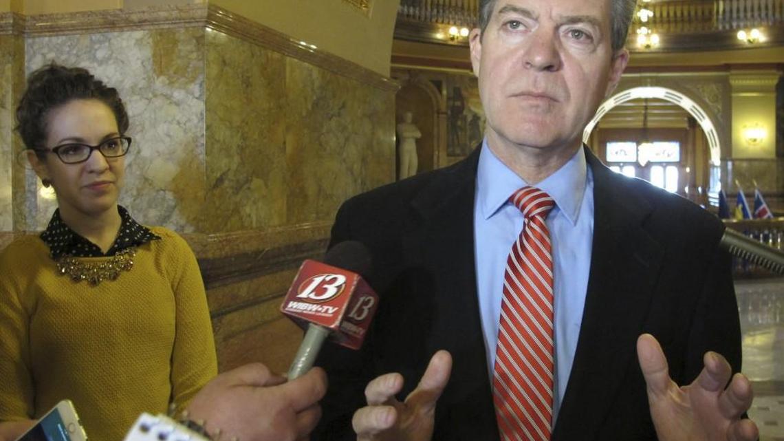 Kansas Gov. Sam Brownback answers questions from the media on Wednesday, April 26, 2017, at the Statehouse in Topeka.