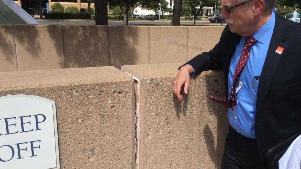City Public Works Deputy Director Joe Pajor stands near a crack between concrete panels above the basement entrance of Century II discovered after last weekend’s earthquake. (Sept. 6, 2016)