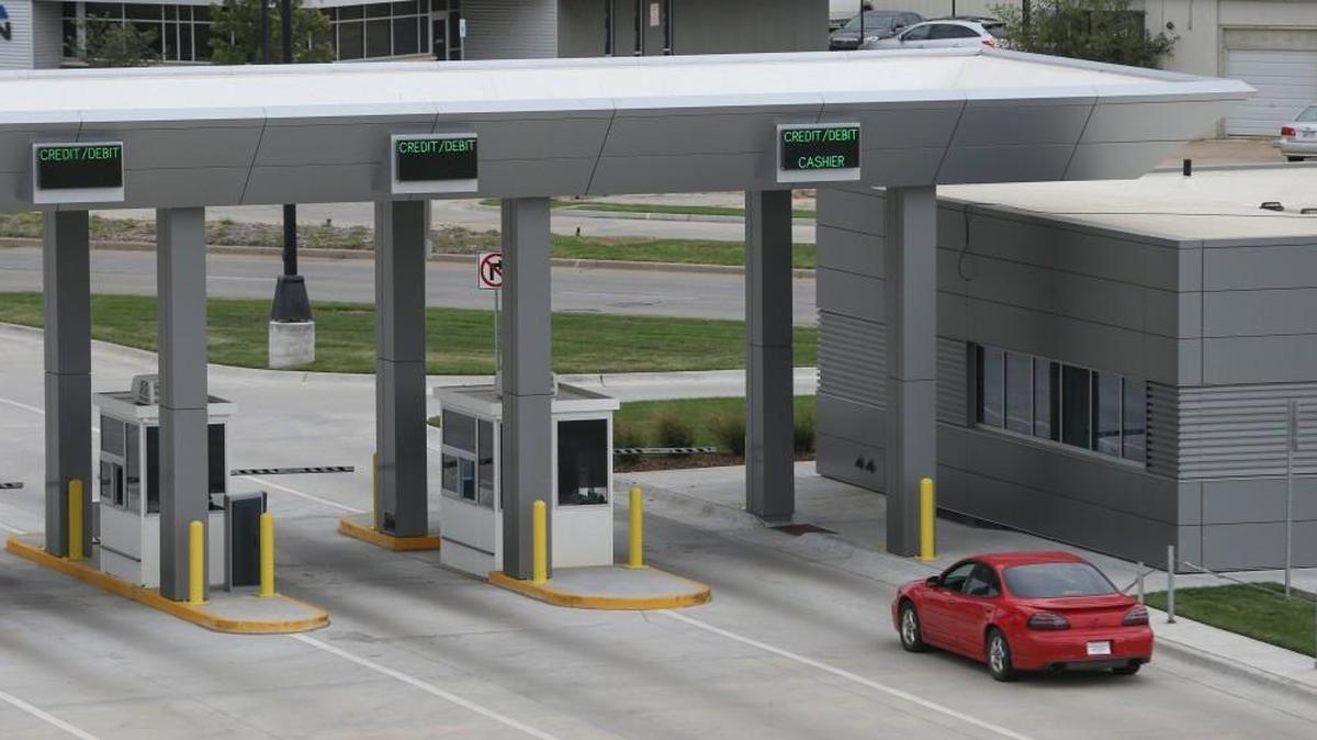 The passes were for the paid public-parking lots and were separate from the passes issued to airport workers who park in employee lots.