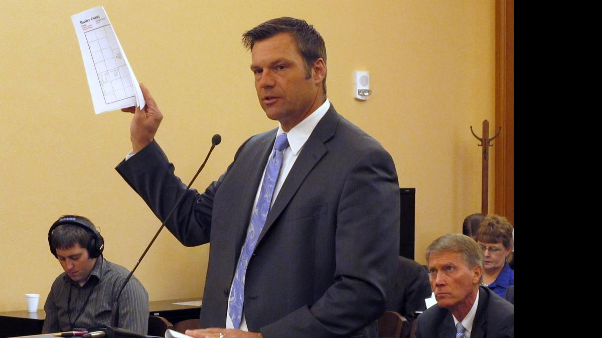 
Kansas Secretary of State Kris Kobach testifies during a meeting of a legislative study committee on election issues last year in Topeka. (Nov. 21, 2014)
