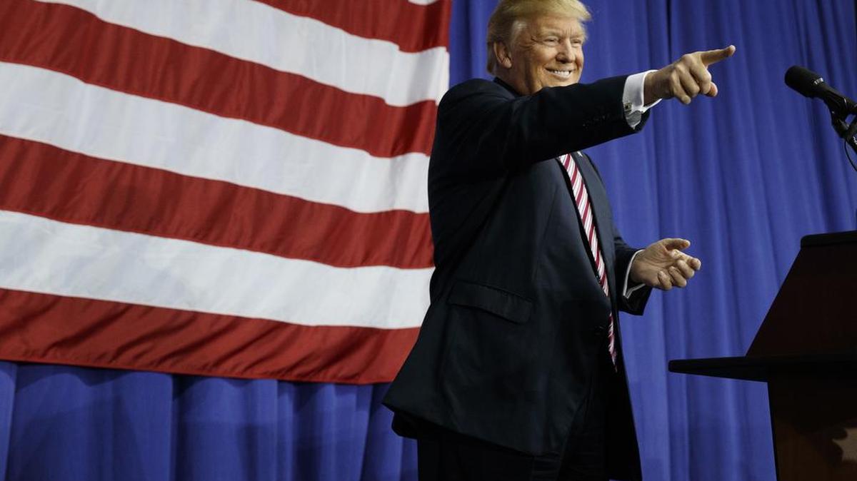 Republican presidential candidate Donald Trump arrives to speak Thursday at a campaign rally at the Delaware County Fair in Delaware, Ohio.