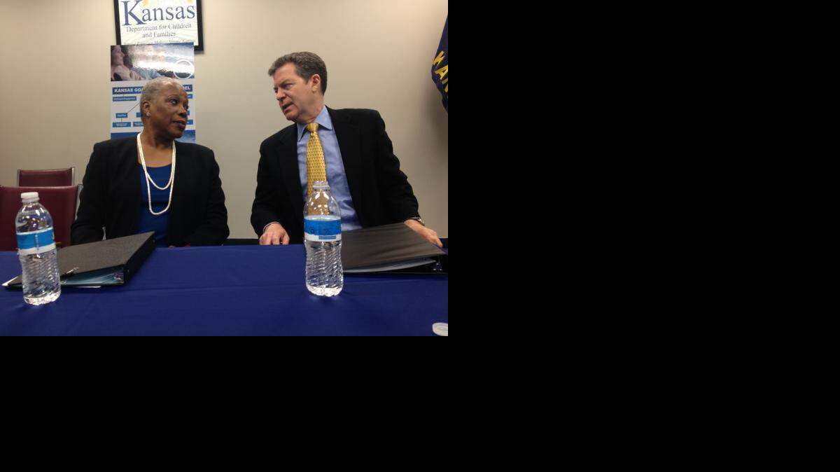 
USDA Administrator Audrey Rowe talks with Kansas Gov. Sam Brownback during a news conference to announce a grant to develop work training programs for food stamp recipients. (March 23, 2015)

