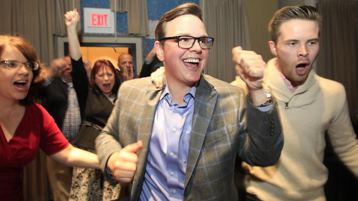 Michael O'Donnell heads to the podium to give a victory speech after defeating Tim Norton in the Sedgwick County Commission race in November.