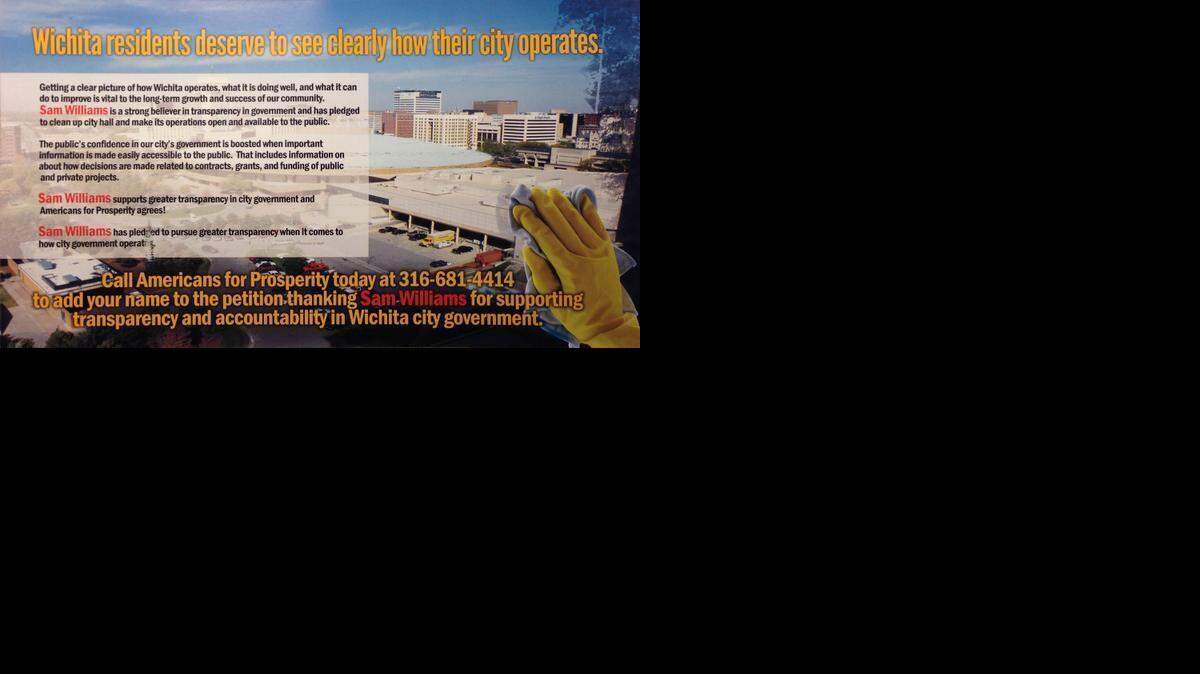 
The mailer’s flip side shows a glistening photo of downtown that says mayoral candidate Sam Williams has “pledged to pursue greater transparency when it comes to how city government operates.”

