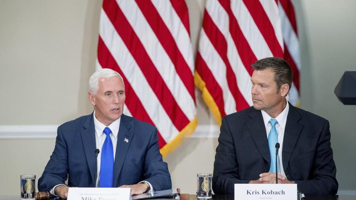 Vice President Mike Pence (left) accompanied by Kansas Secretary of State Kris Kobach, spoke during the first meeting of the Presidential Advisory Commission on Election Integrity in July.