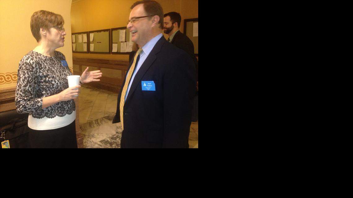 
Diane Gjerstad, lobbyist for the Wichita school district, talks to Dave Trabert, president of the Kansas Policy Institute, after the hearing Tuesday on the school funding bill.
