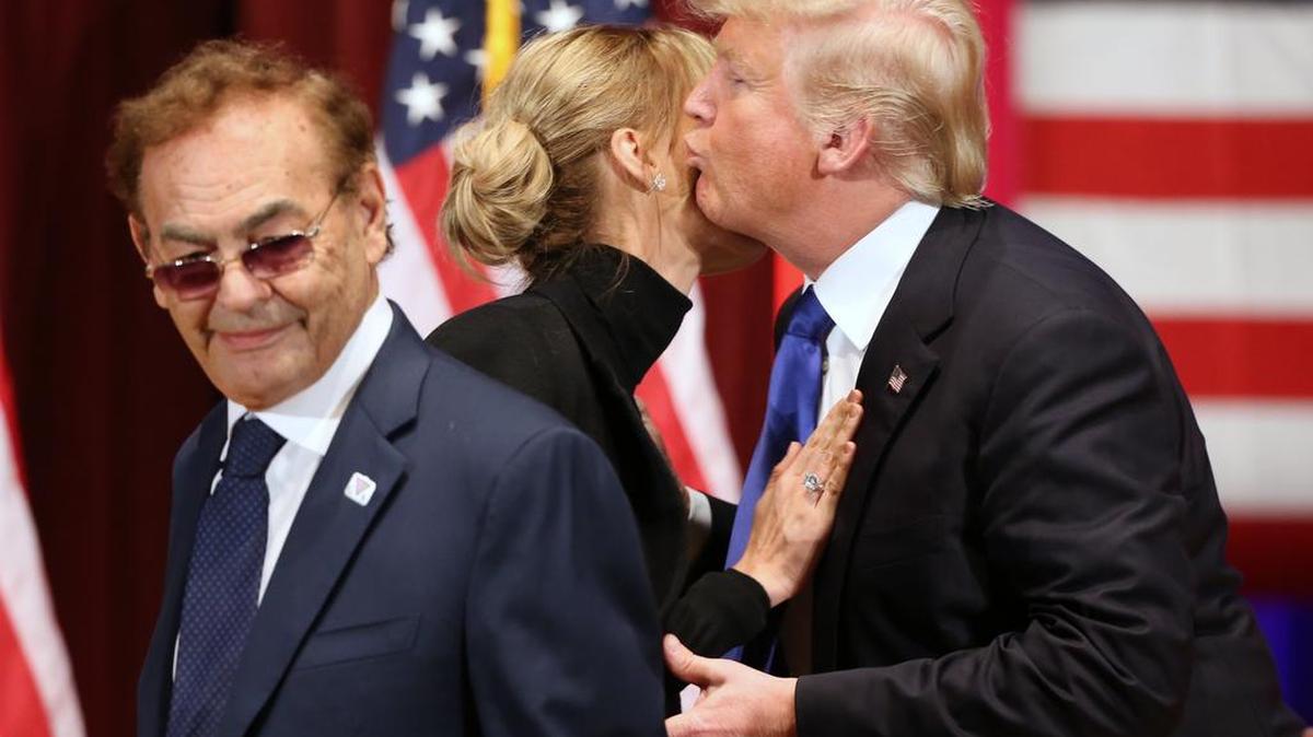 Republican presidential candidate Donald Trump greets Oleksandra Nikolayenko, wife of Treasure Island Casino owner Phil Ruffin, left, at a event in Des Moines, Iowa, in 2016.