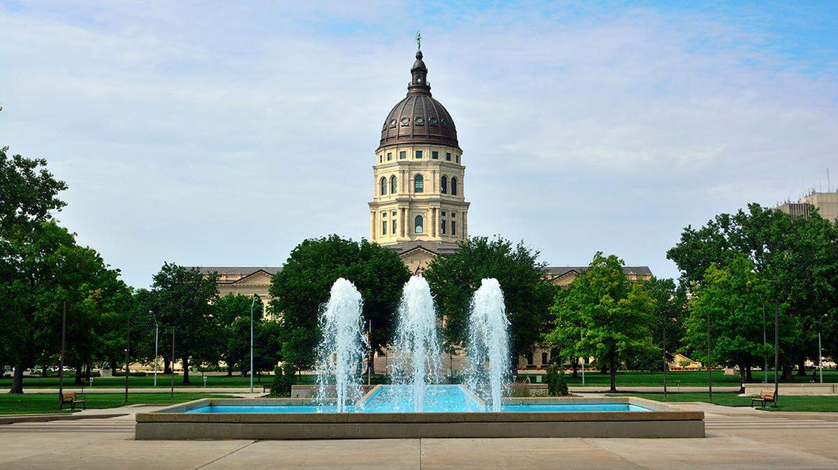 Kansas State Capitol Building with Fountains on a Sunny Day