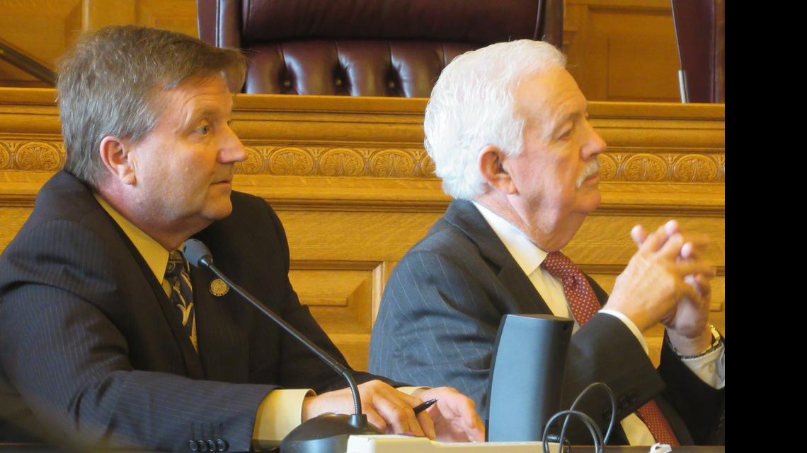 
House Majority Leader Jene Vickrey, R-Louisburg, left, and House Speaker Ray Merrick, R-Stilwell, listen to lawmakers’ concerns during a GOP caucus meeting on Thursday. 
