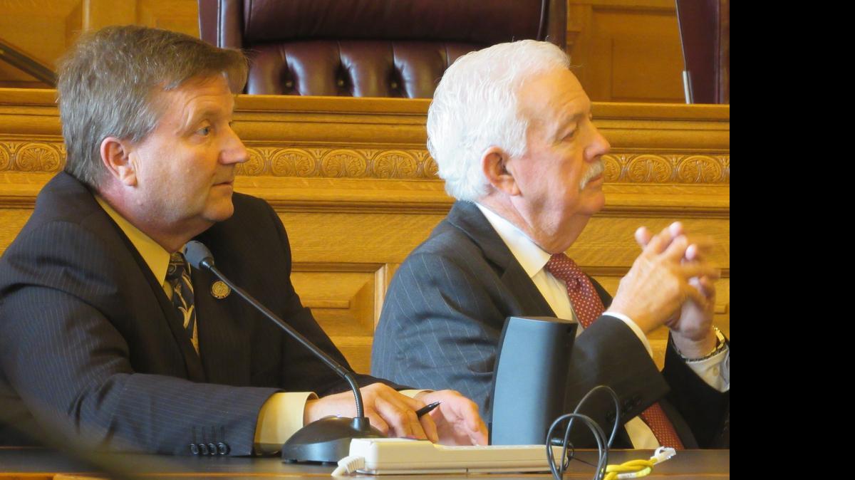 
House Majority Leader Jene Vickrey, R-Louisburg, left, and House Speaker Ray Merrick, R-Stilwell, listen to lawmakers’ concerns during a GOP caucus meeting on Thursday. 
