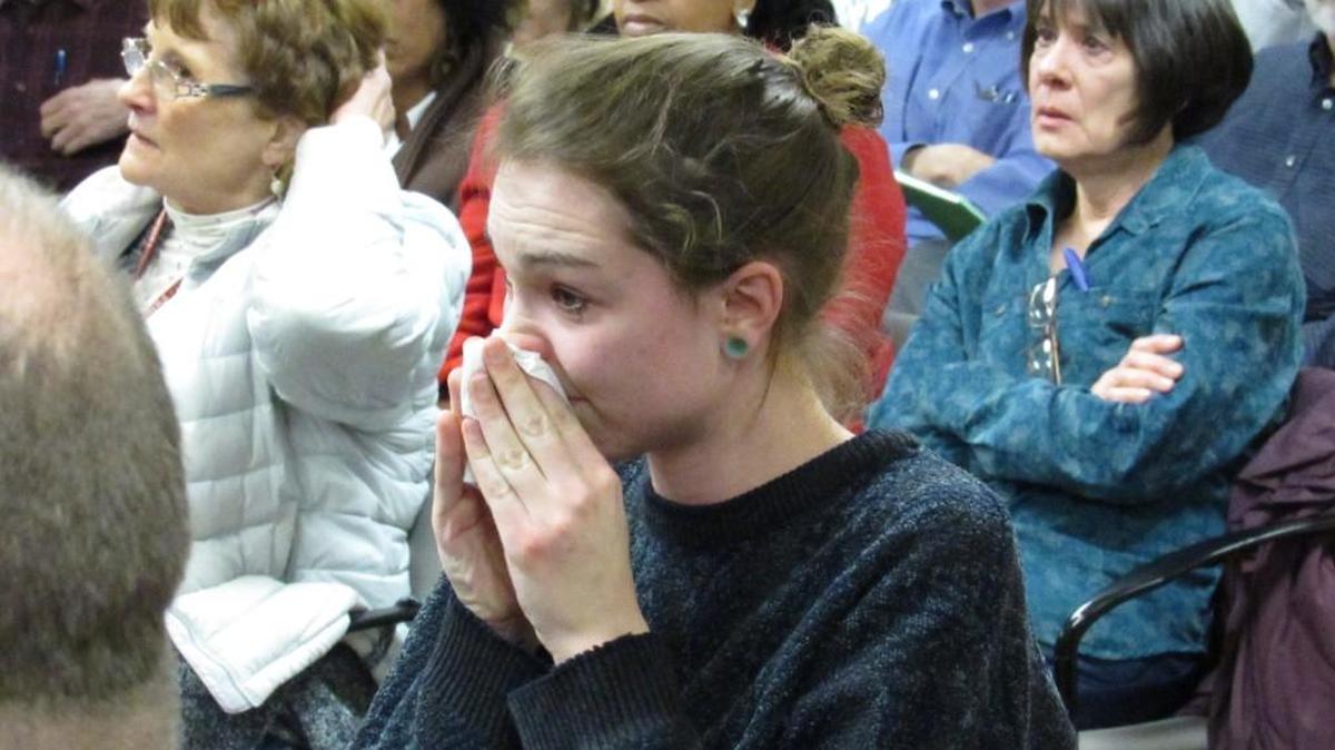 Wichita State University science education student Marcillene Dover composes herself Wednesday after a tearful speech to legislators about what it’s like to live with multiple sclerosis without health insurance. Dover asked lawmakers to expand KanCare to cover people like her. (Jan. 6, 2016)