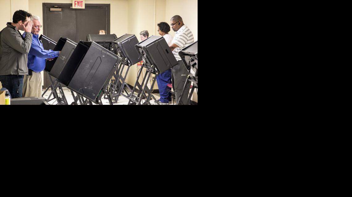 
Wichitans take advantage of advance voting at the election office in the old Sedgwick County courthouse in 2014. 
