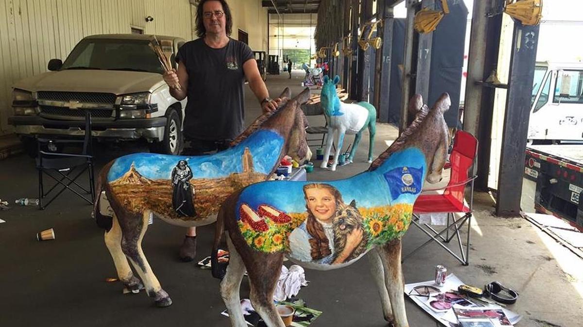 Artist Edgar Jerins of New York City painted the Kansas, front, and Nebraska donkeys, two of 57 works on display in Philadelphia in July for the Democratic National Convention.