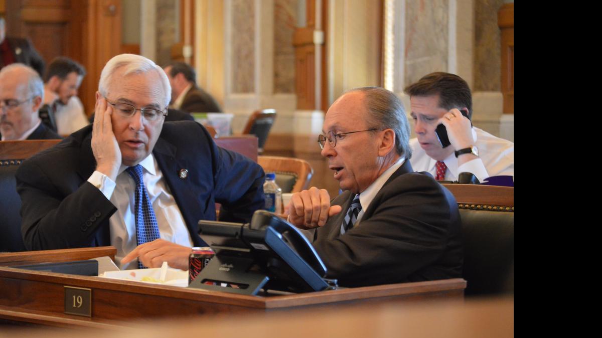 
Kansas House Taxation Committee Chairman Marvin Kleeb, R-Overland Park, right, confers with Rep. Jerry Lunn, R-Overland Park, during the chamber's session last week at the Statehouse in Topeka. (May 21, 2015) 

