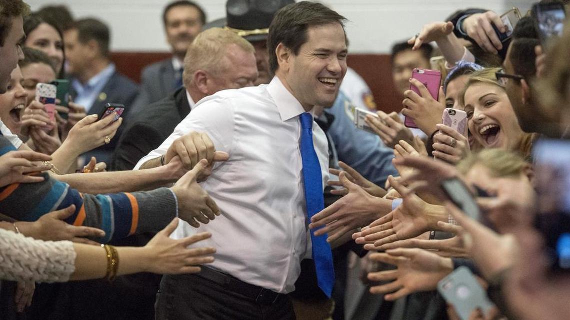 Republican presidential candidate, Sen. Marco Rubio, R-Florida,delights supporters as he enters a rally at Roanoke College in Salem, Va., on Sunday.