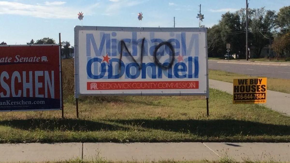A Michael O’Donnell campaign sign, with “NO” spray-painted on it, is seen at the intersection of 47th Street South and Meridian. (Nov. 1, 2016)