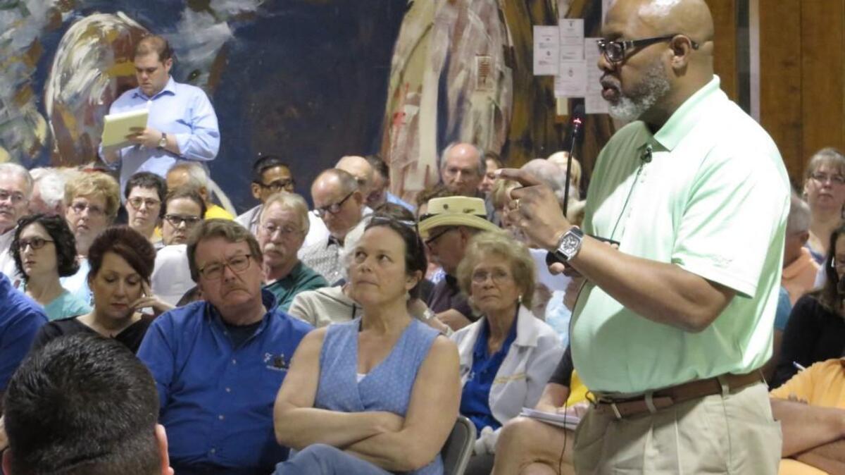 Developer Andy Bias tries to convince Riverside residents that the senior housing project proposed in their neighborhood would be a good thing.