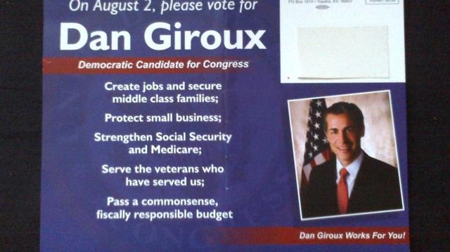 Robert Tillman blames this postcard, paid for by the Kansas Democratic Party on behalf of his opponent Dan Giroux, for his loss in the primary.