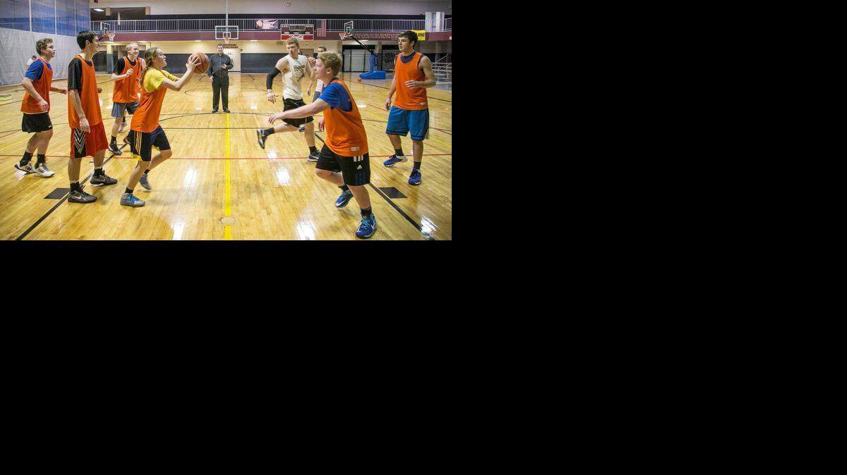 
The Wichita Defenders home-school basketball team runs a drill during practice at Immanuel Baptist Church. (Jan. 28, 2015)
