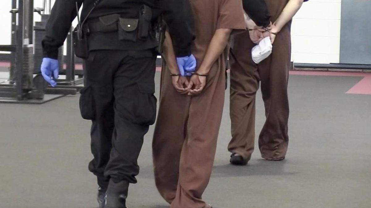 Prisoners that are part of the segregated population are led through a recreation area by guards at El Dorado correctional facility. Recent staff shortages and an increase in the prisoner population have raised some concerns.