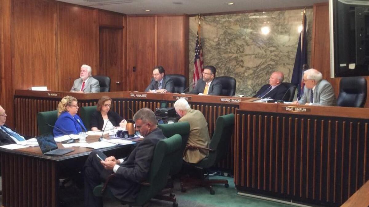 From left, Sedgwick County Commissioners Tim Norton, Karl Peterjohn, Jim Howell, Richard Ranzau and Dave Unruh discuss the de-regulation of some wastewater inspections during a meeting last week. (Sept. 7, 2016)