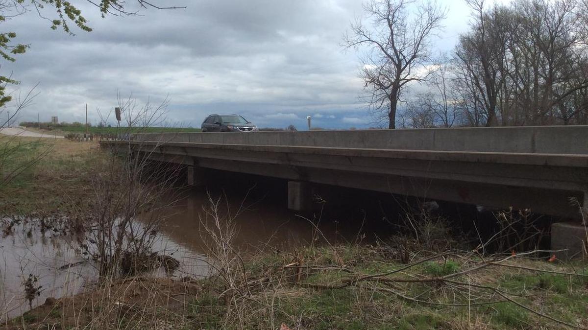 A car drives over a bridge on Broadway between 117th Street and 125th Street North in far northern Sedgwick County. A project to upgrade the bridge was delayed in the county’s capital improvement program.
