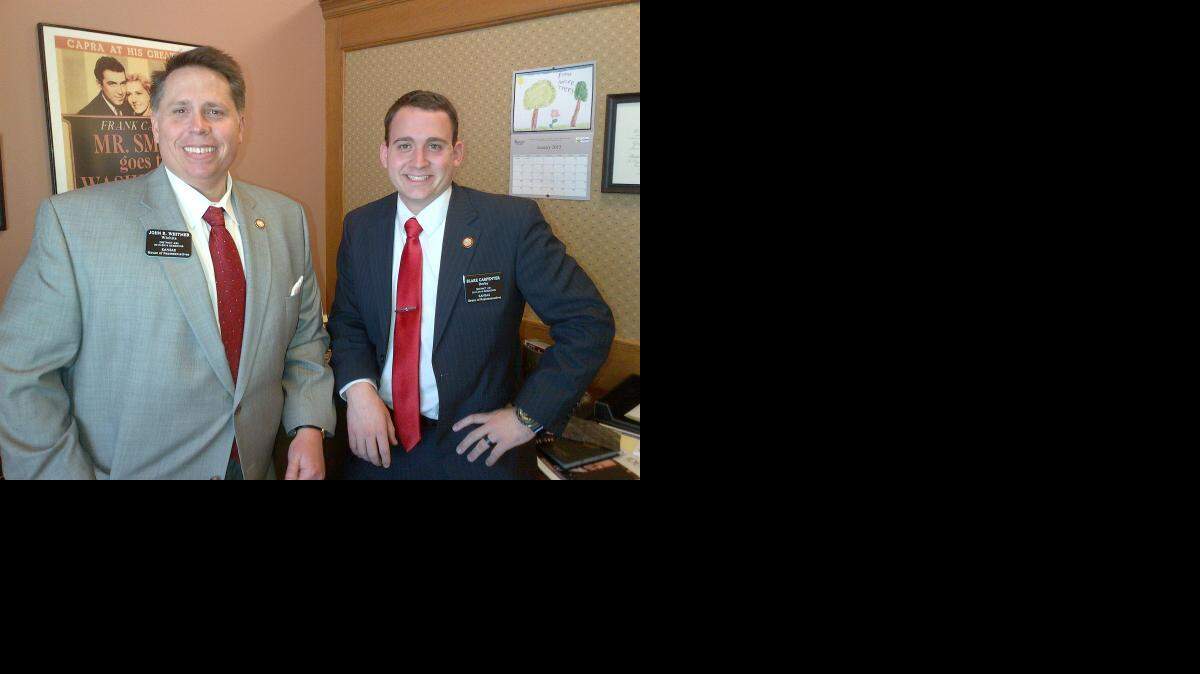 
Reps. John Whitmer, left, R-Wichita, and Blake Carpenter, R-Derby, will share an office and room together during the legislative session. (Jan. 12, 2015)
