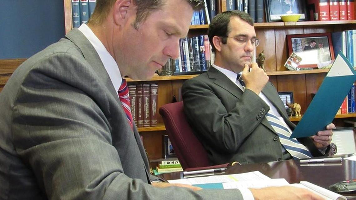 Secretary of State Kris Kobach, left, and Attorney General Derek Schmidt are both weighing bids for the 2018 Kansas governor’s race.