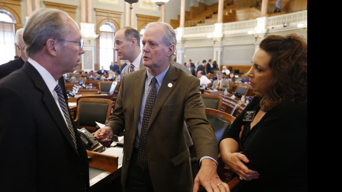 
Rep. Gene Suellentrop of Wichita (center) talks with Kansas House Taxation Committee Chairman Marvin Kleeb, R-Overland Park (left) as Rep. Erin Davis of Olathe looks on after the defeat of HB 2109 Thursday morning.

