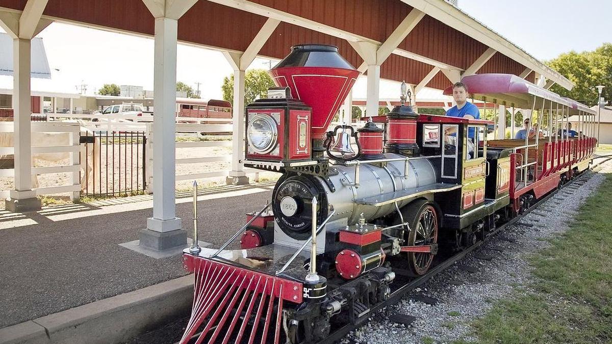 
The vintage half-size train pulls into the train station at O.J. Watson Park. (2013)

