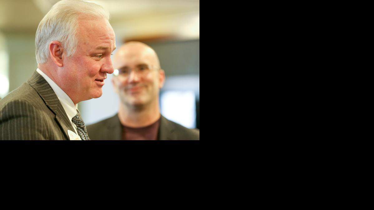 
Libertarian Kansas governor candidate Keen Umbehr and his campaign manager Stacey Davis, right, talk to the press during the Libertarian Convention in April.

