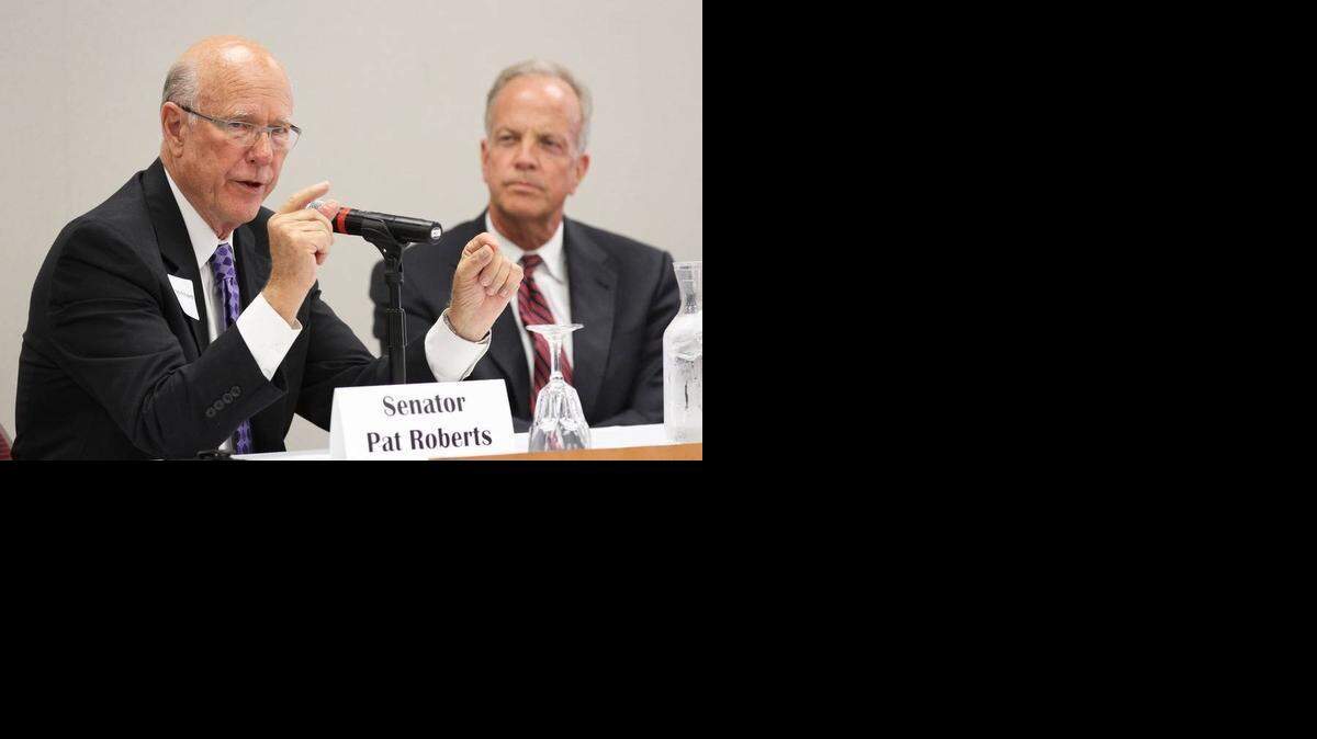 
Kansas Sens. Pat Roberts, left, and Jerry Moran, shown at a summit in 2014 in Wichita, are expected to participate in a marathon voting session Thursday in Washington, D.C.
