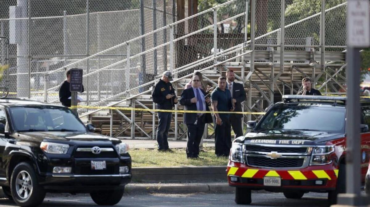 Law enforcement officers investigate the scene of a shooting near a baseball field in Alexandria, Va., on Wednesday where House Majority Whip Steve Scalise of Louisiana was shot at a congressional baseball practice (June 14, 2017).
