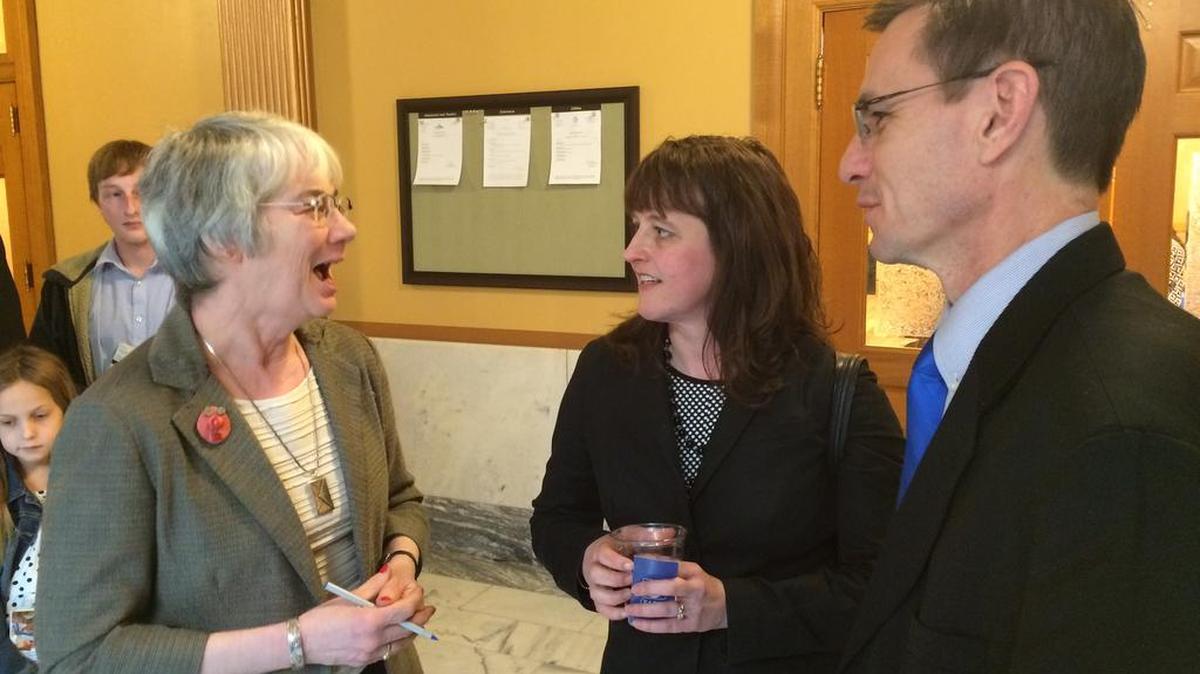 Sen. Marci Francisco, D-Lawrence, left, congratulates Sarah Shipman, center, after her nomination for a cabinet position was approved by the Senate Ways and Means Committee on Monday.