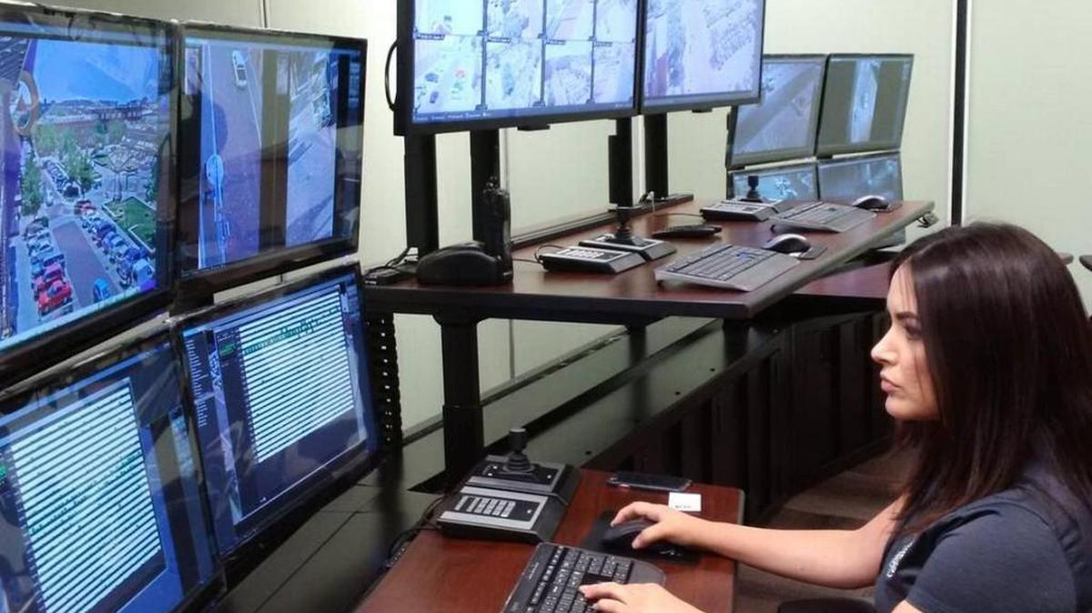 Wichita Police Department employee Erika Cepeda monitors Old Town cameras in the City Hall security surveillance center.