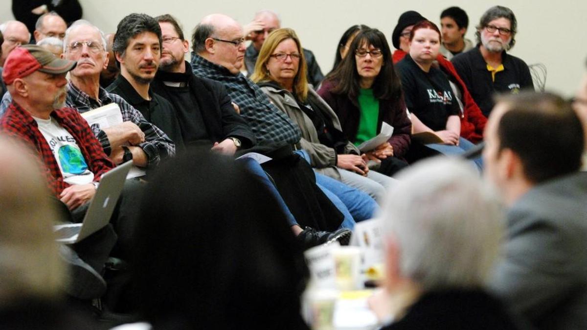 Audience members listen to speakers at a south-central Kansas legislative delegation forum in 2013 at the Hughes Metropolitan Complex.
