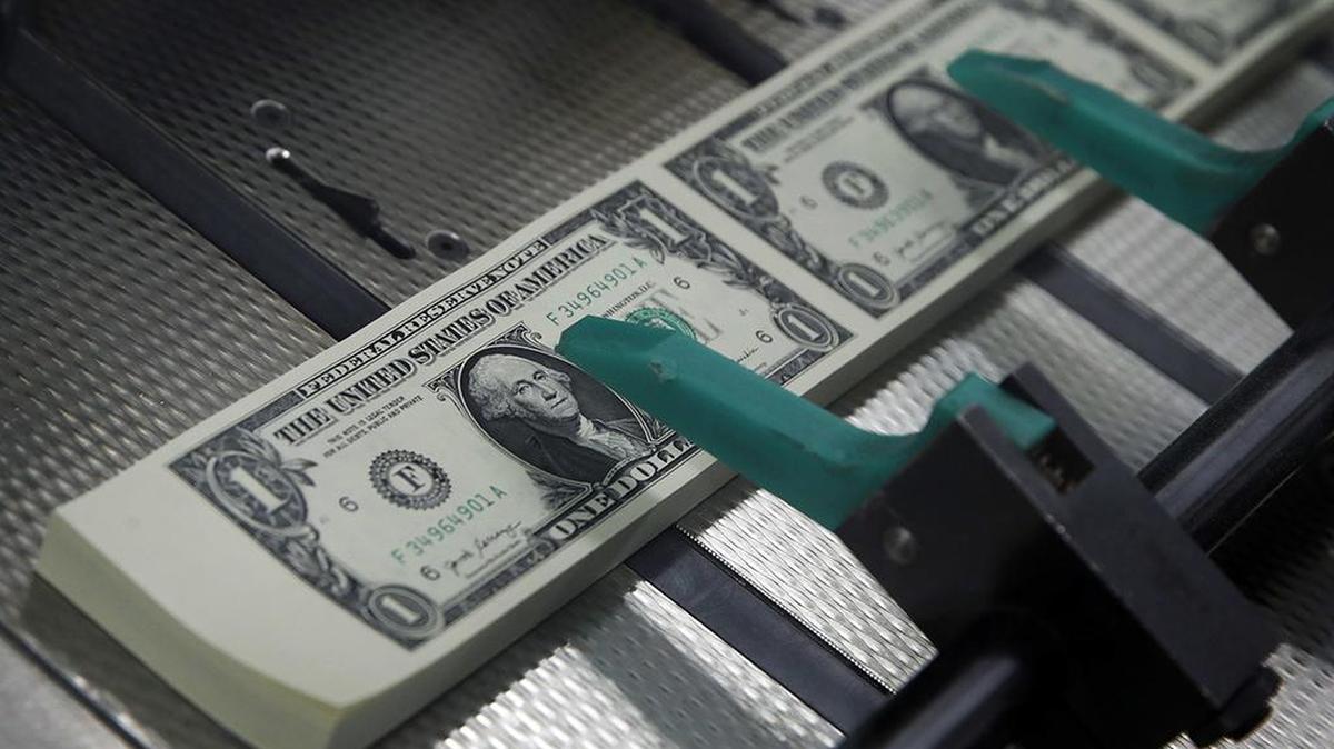 Cash. (AP Photo/Jacquelyn Martin, File)
