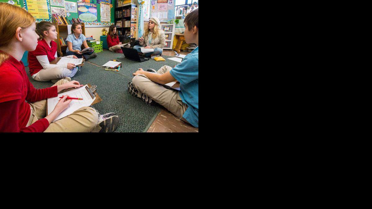 
Gifted-education students listen to a lesson from Andrea Piros at McCollom Elementary School. (Jan. 7, 2015)
