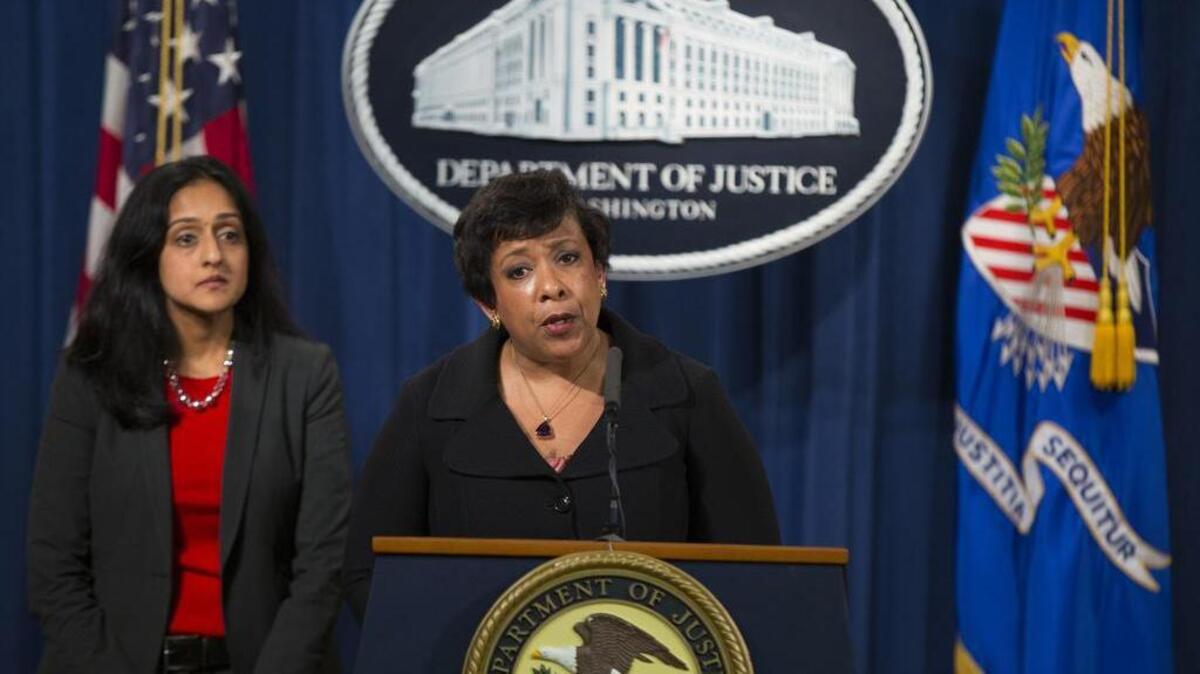 Attorney General Loretta Lynch, accompanied by Vanita Gupta, head of the Justice Department’s civil rights division, left, speaks during a news conference in Washington on May 9. The Justice Department is suing North Carolina over a bathroom access law that it said violates the rights of transgender people.