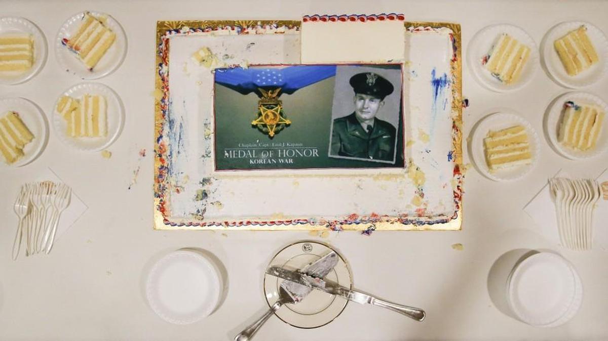 Father Emil Kapaun’s image was on a cake during a reception after the Hall of Heroes induction ceremony for Kapaun at the Pentagon in 2013. Kapaun, who died in a North Korean prisoner of war camp in 1951, was posthumously awarded the Medal of Honor by President Obama the day before. (April 12, 2013)