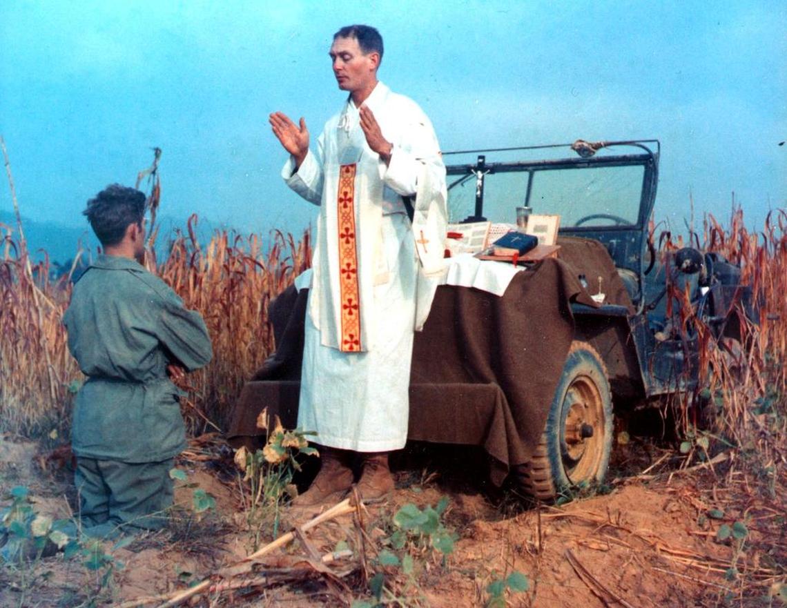 Father Emil Kapaun celebrates Mass with this jeep hood as an altar on Oct 7, 1950. Kapaun was captured by Chinese troops during the Korean War less than a month later, on Nov. 2, 1950. He died in a prison camp on May 23, 1951, at age 35.