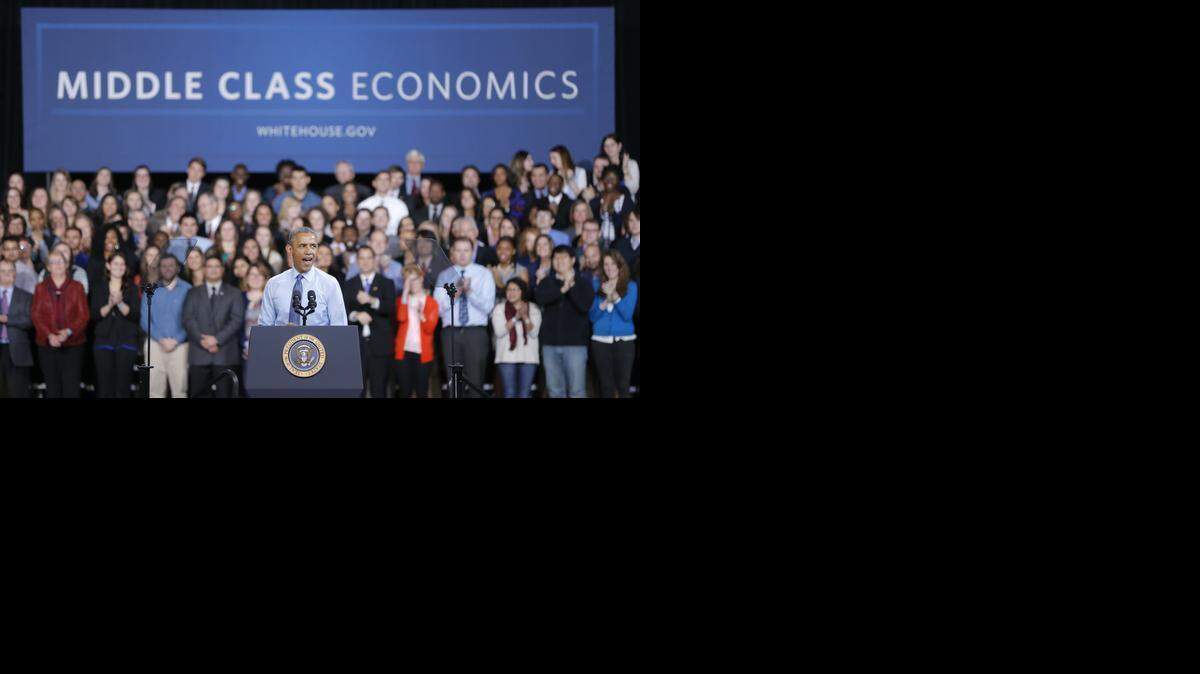 
President Barack Obama speaks at Anschutz Sports Pavillion at the University of Kansas on Thursday. Obama was promoting his middle class economic agenda he outlined in his State of the Union speech earlier this week.
